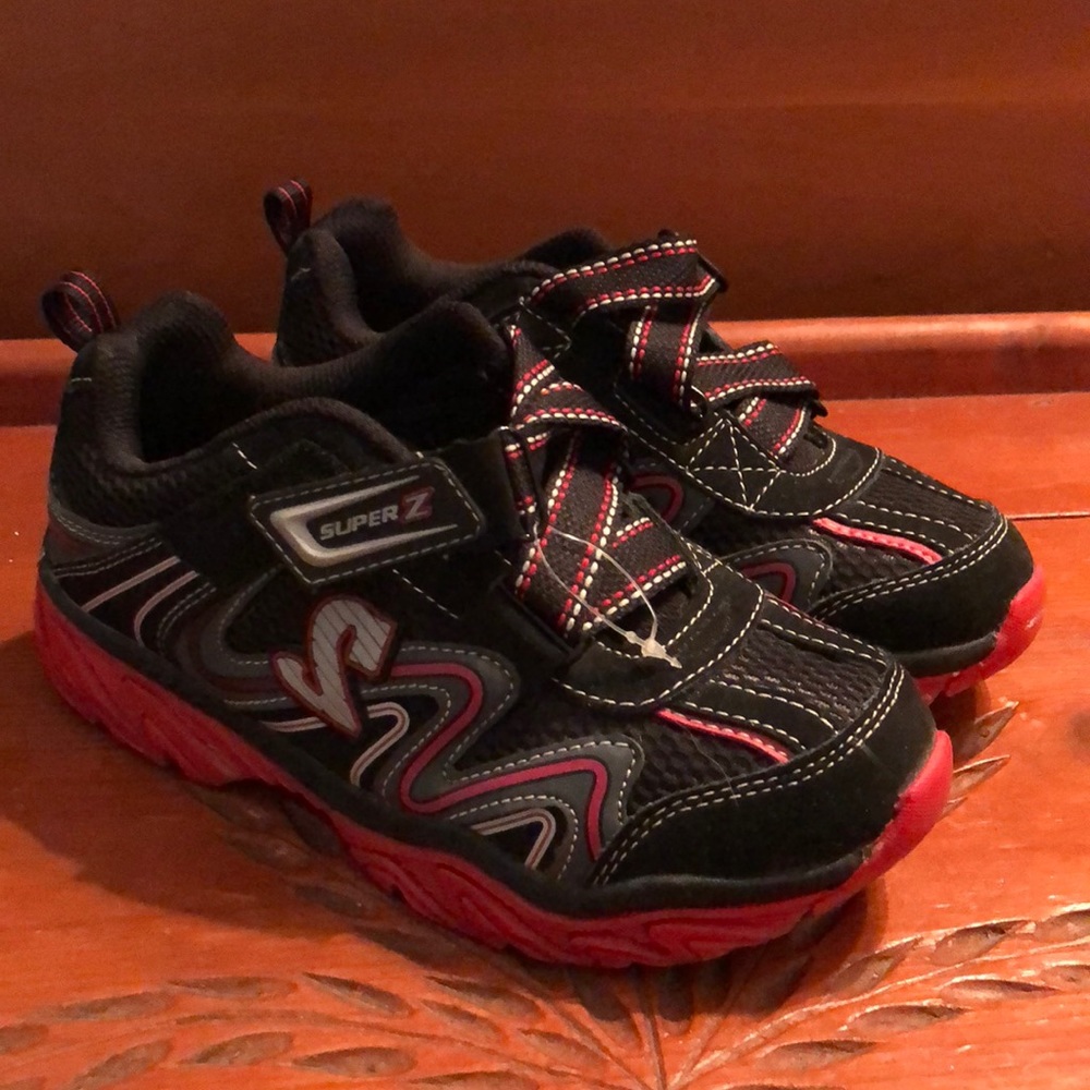 Like-new Skechers Super Z